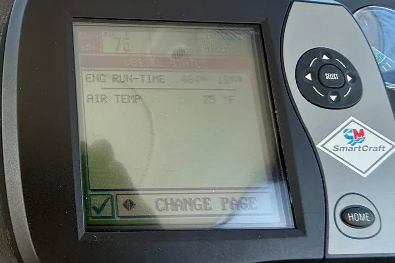 Slide: The Image of SmartCraft display showing engine runtime and air temperature on a 2006 Tiara Yachts 3600 Sovran. - 31