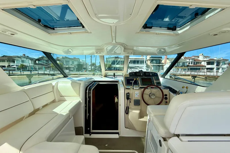 Slide: The Image of Interior view of 2006 Tiara Yachts 3600 Sovran, featuring helm and seating area. - 33