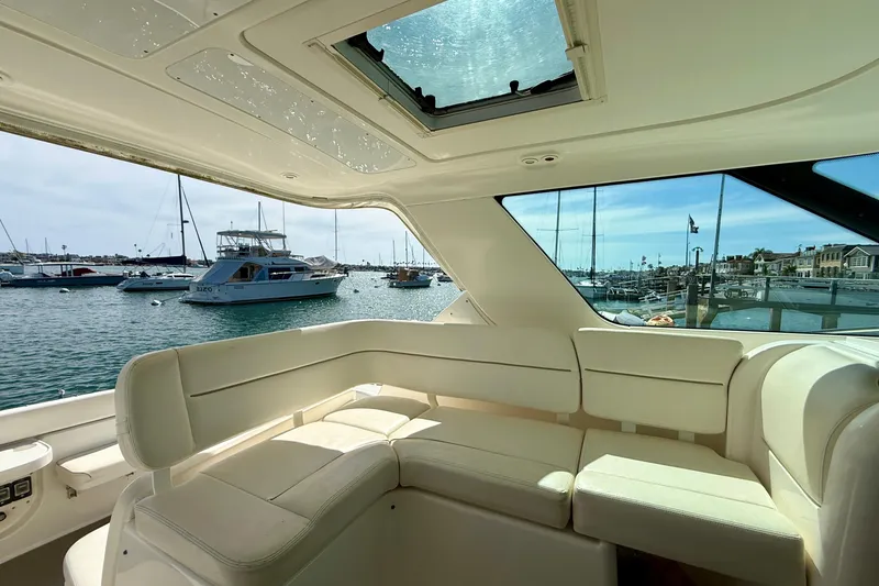 Slide: The Image of Interior view of a 2006 Tiara Yachts 3600 Sovran, overlooking a marina. - 37