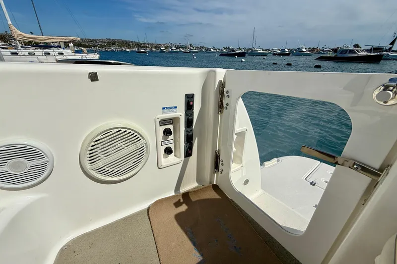 Slide: The Image of 2006 Tiara Yachts 3600 Sovran deck view with speakers and ocean backdrop. - 42