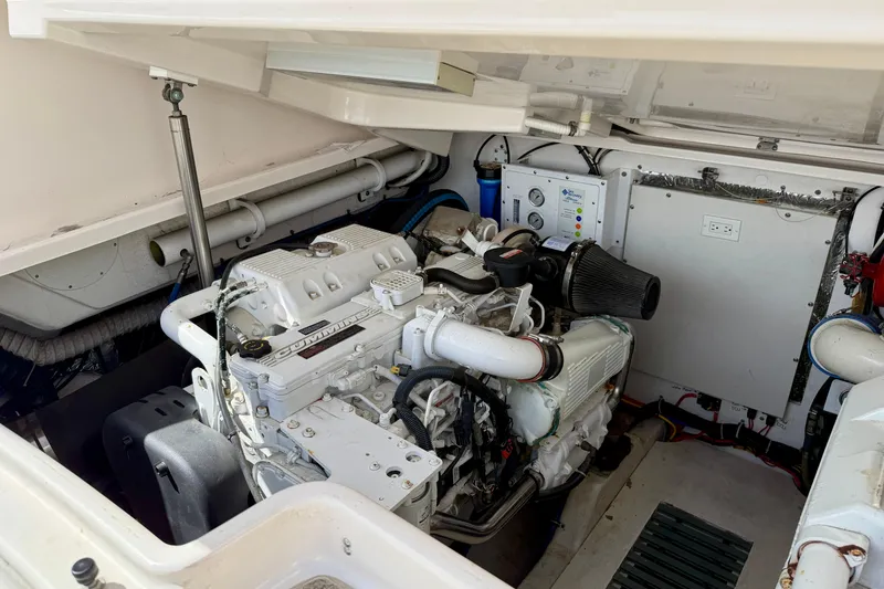Slide: The Image of Engine compartment of a 2006 Tiara Yachts 3600 Sovran, featuring a Cummins engine. - 44
