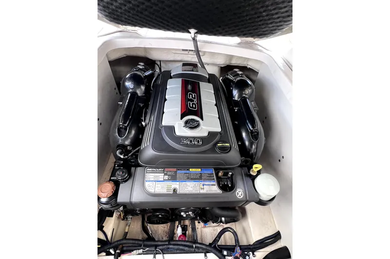 Slide: The Image of 2020 Chaparral 237 SSX boat interior with white seating and sleek design. - 11