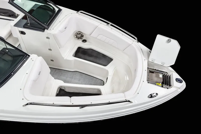 Slide: The Image of 2020 Chaparral 237 SSX boat interior with white seating and a central table. - 14