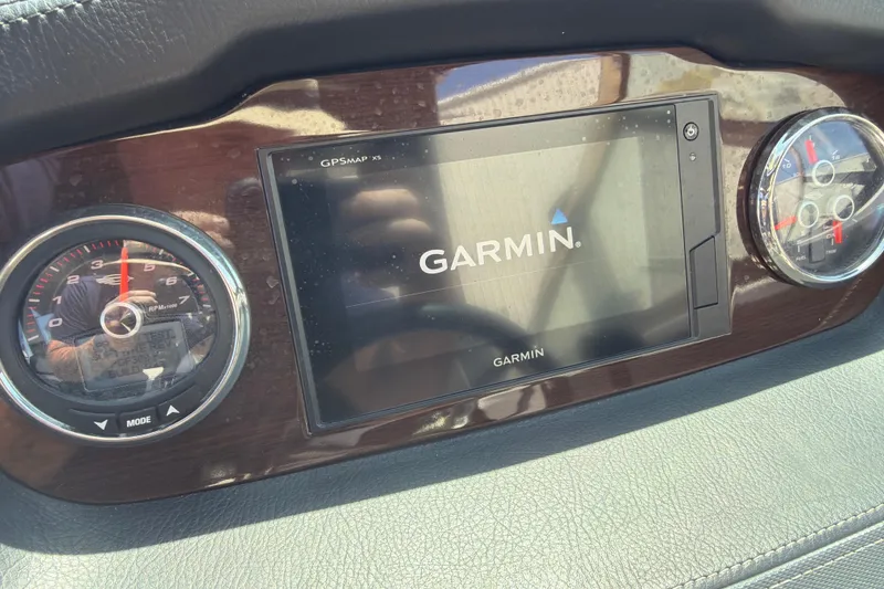 Slide: The Image of Dashboard of 2020 Chaparral 237 SSX featuring Garmin GPS and gauges. - 21