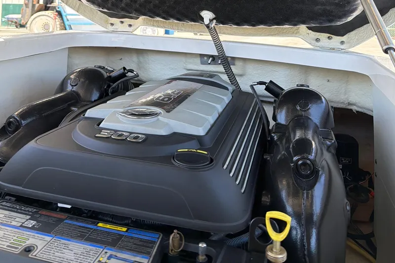 Slide: The Image of Engine compartment of 2020 Chaparral 237 SSX boat with open hatch. - 28