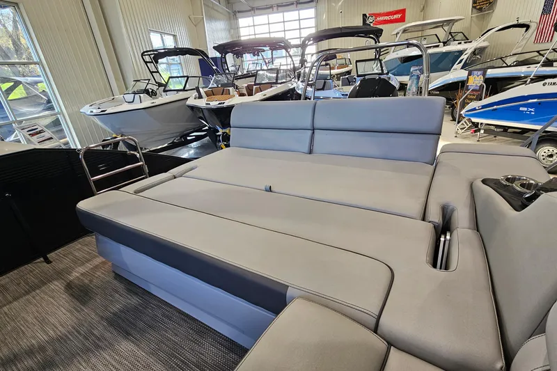 Slide: The Image of 2020 Bennington 23 R Swingback boat interior with spacious seating in showroom. - 10