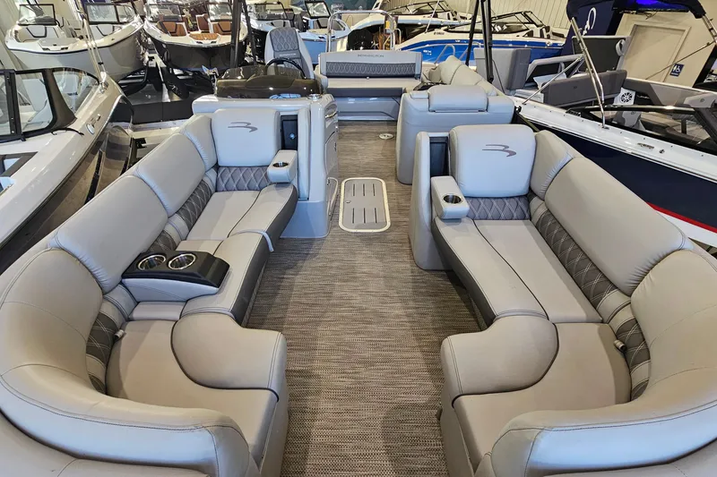 Slide: The Image of 2020 Bennington 23 R Swingback pontoon boat interior with luxurious seating and cup holders. - 18