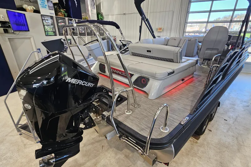 Slide: The Image of 2020 Bennington 23 R Swingback pontoon boat with Mercury engine in showroom. - 4