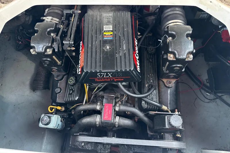 Slide: The Image of Engine compartment of a 1996 Sea Ray 240 Sundancer with 5.7LX V8 Thunderbolt ignition. - 17