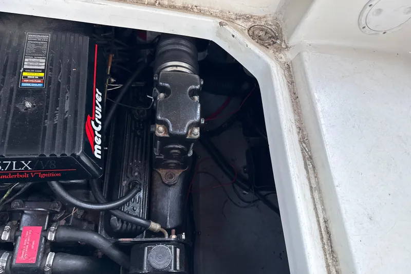 Slide: The Image of Engine compartment of a 1996 Sea Ray 240 Sundancer with MerCruiser 5.7LX V8 engine. - 18