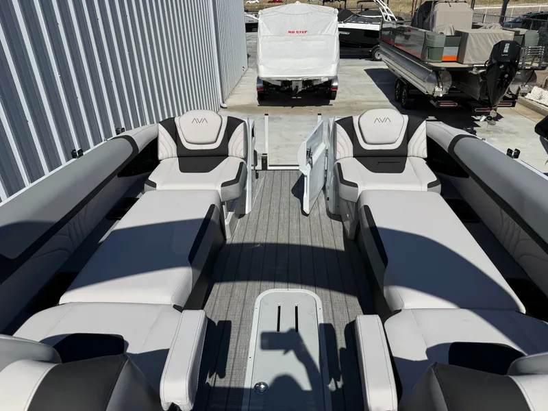 Slide: The Image of Luxurious Avalon Carbon Series boat with lounge seating, 2026 model. - 10