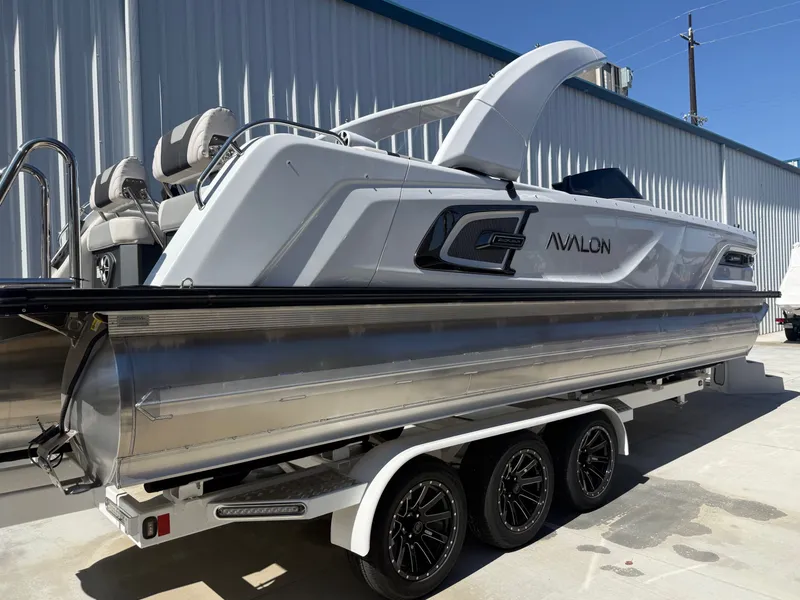 Slide: The Image of 2026 Avalon Carbon Series boat with 400HP Mercury V10, side view. - 2