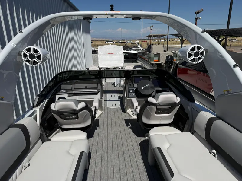 Slide: The Image of Interior of 2026 Avalon Carbon Series Excalibur Quad Lounger boat. - 4