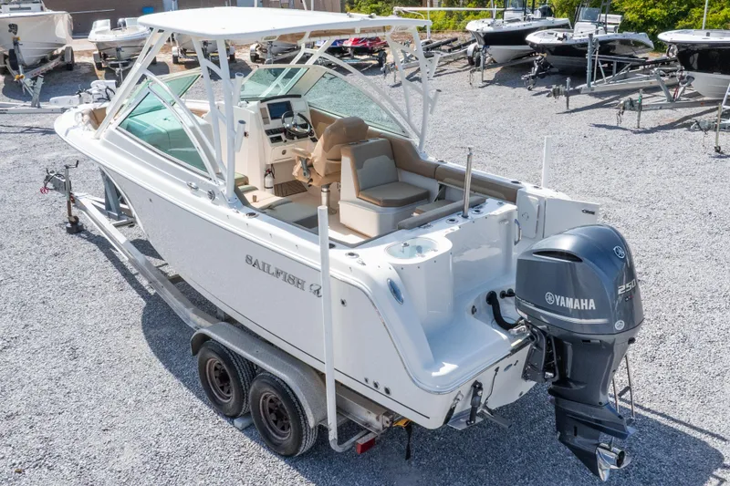 Slide: The Image of 2018 Sailfish 245 DC boat with Yamaha engine on trailer in a boatyard. - 42