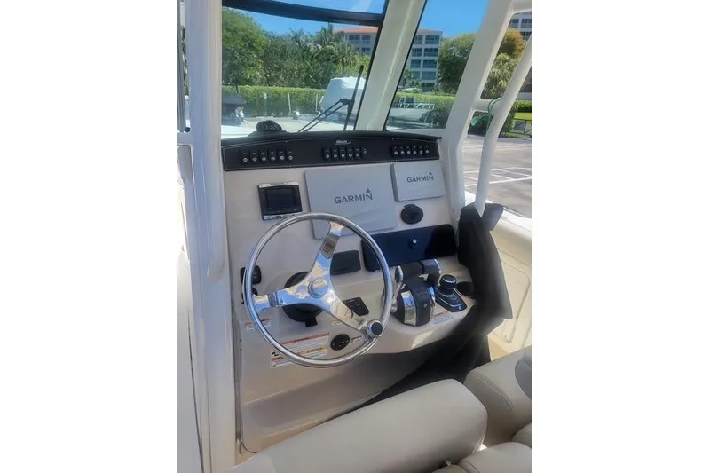 Slide: The Image of Helm of 2018 Boston Whaler 280 Outrage with Garmin navigation system. - 6
