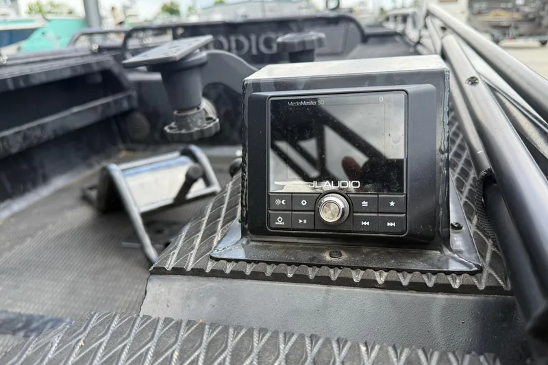 Slide: The Image of JL Audio MediaMaster 50 installed on 2024 Prodigy 17 boat dashboard. - 12