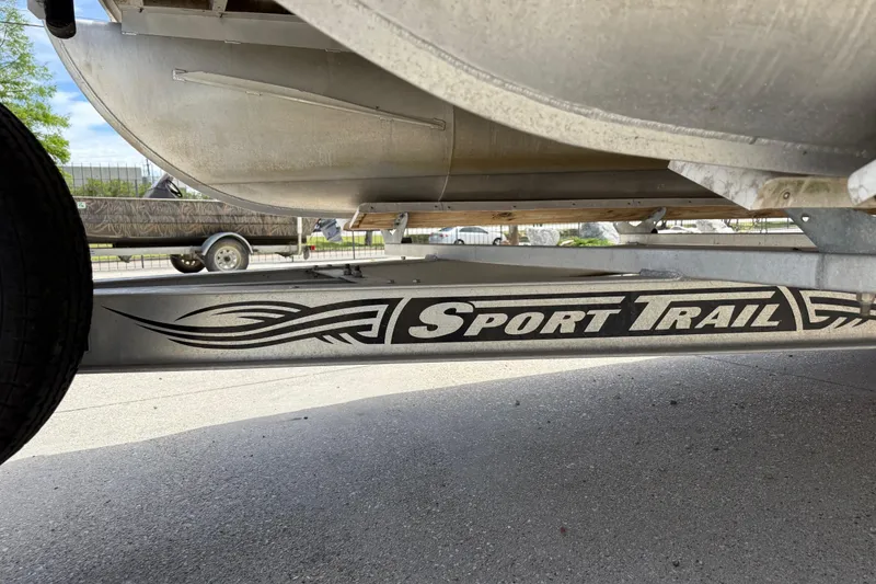 Slide: The Image of Trailer for 2012 South Bay 522 CR pontoon boat, featuring Sport Trail branding. - 9