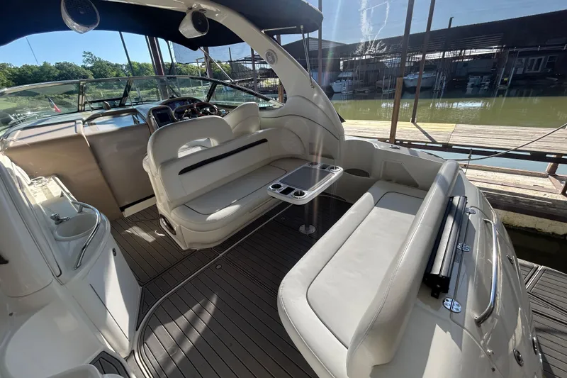 Slide: The Image of 2004 Sea Ray 360 Sundancer interior with sleek cabinetry and modern design elements. - 11
