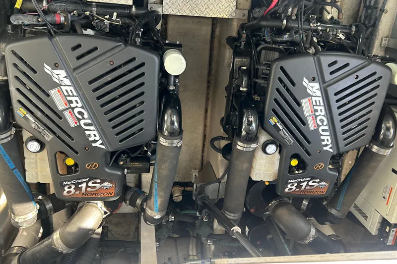 Slide: The Image of Twin Mercury MerCruiser 8.1S Horizon engines in a 2004 Sea Ray 360 Sundancer boat. - 30