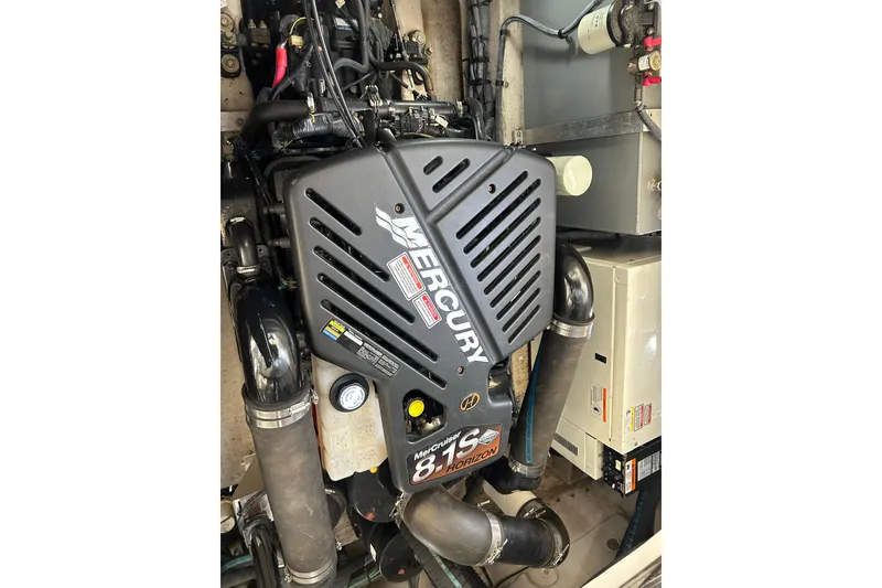 Slide: The Image of Engine compartment of a 2004 Sea Ray 360 Sundancer with Mercury 8.1S Horizon engine. - 33