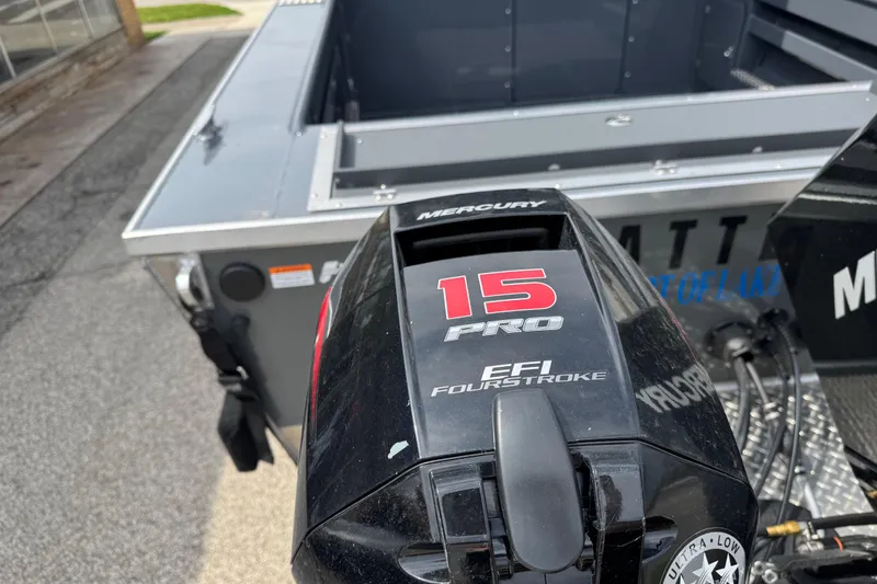 Slide: The Image of 2025 Hewescraft 240 Pacific Cruiser with Mercury 15 Pro EFI FourStroke engine. - 9