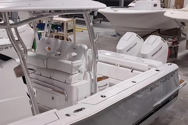 Slide: The Image of 2026 Southport 33 FE boat with Mercury engines in workshop. - 4