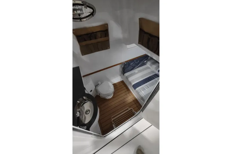 Slide: The Image of Interior of 2026 Southport 33 FE with toilet and sink. - 7