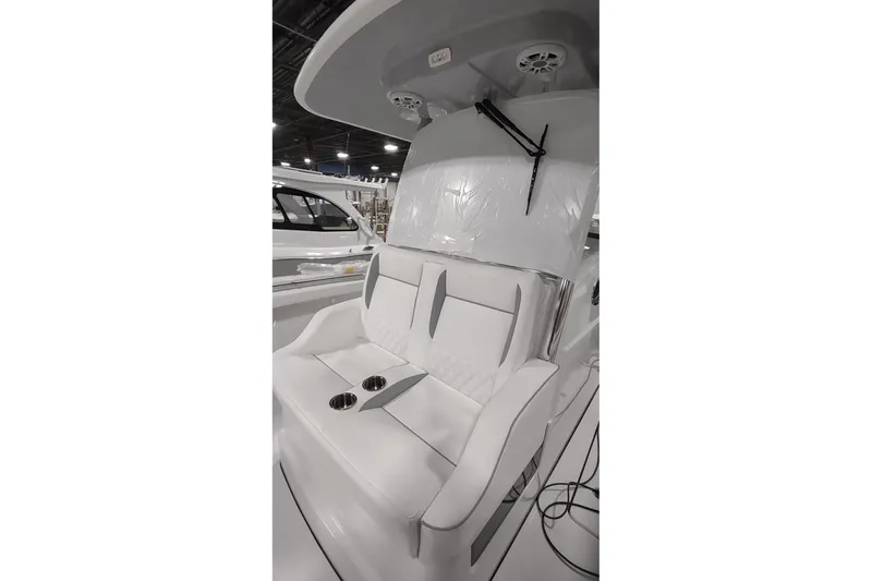 Slide: The Image of Interior of Southport 33 FE 2026 with luxurious white seating. - 8