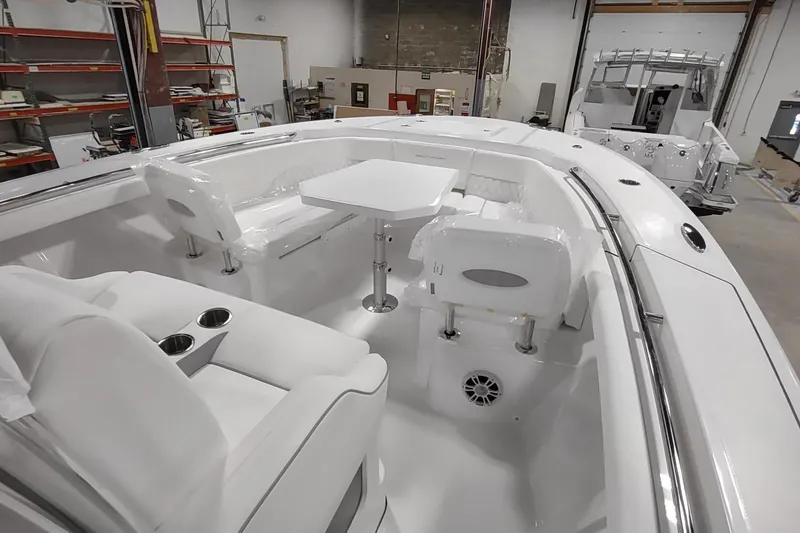 Slide: The Image of Interior view of Southport 33 FE 2026 boat with seating area. - 9