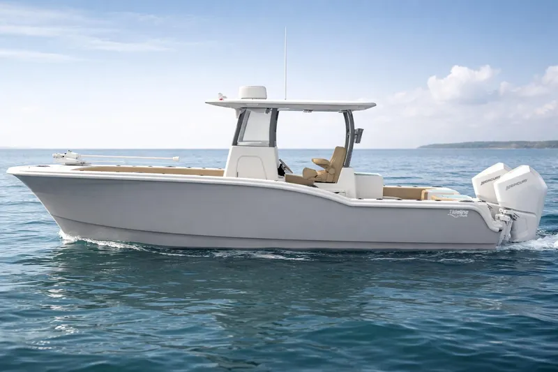 The Image of 2026 Tideline 280 Bluewater boat cruising on open water under a clear sky. - 0