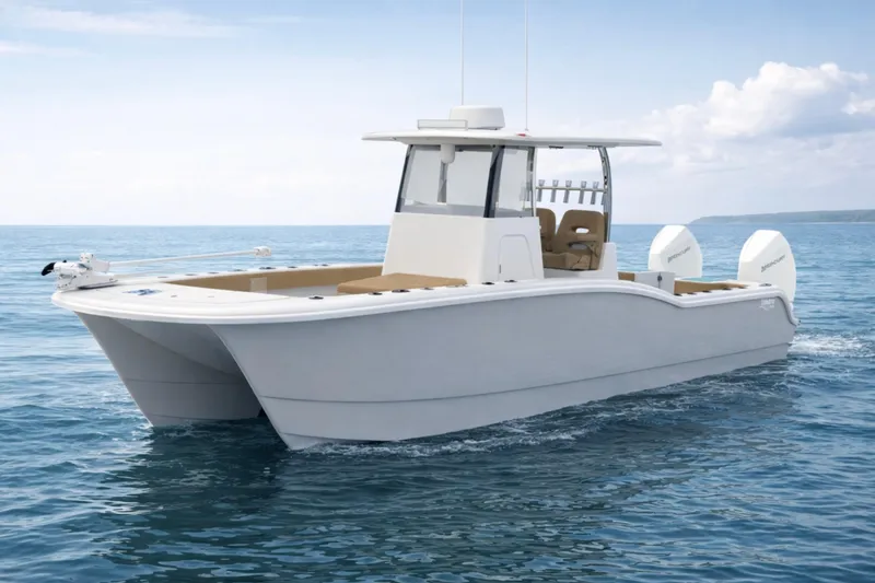 Slide: The Image of 2026 Tideline 280 Bluewater boat cruising on open sea under clear skies. - 2