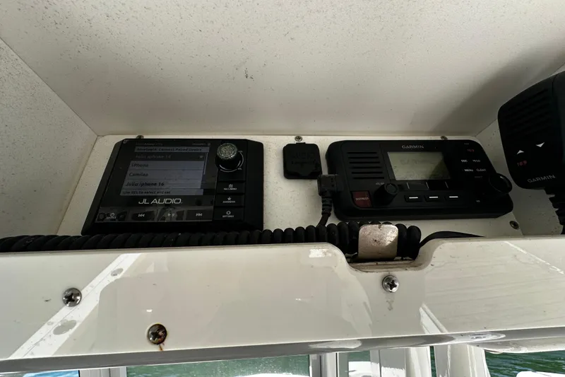 Slide: The Image of 2019 Pioneer 266 Pelagic boat dashboard with JL Audio and Garmin devices. - 22