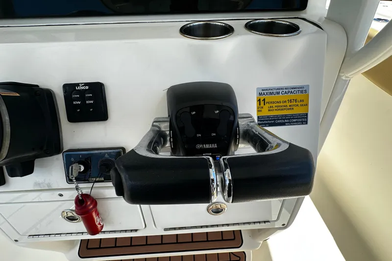 Slide: The Image of Control panel of 2019 Pioneer 266 Pelagic boat with Yamaha throttle and capacity label. - 23