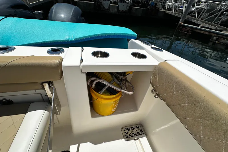 Slide: The Image of Interior of 2019 Pioneer 266 Pelagic boat with seating and storage area. - 32
