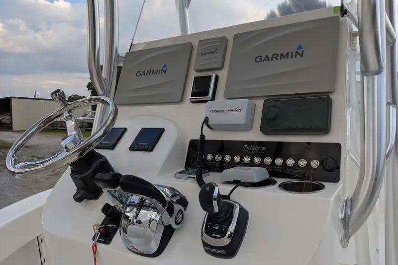 Slide: The Image of Helm of 2026 Tideline 235 Hybrid boat with Garmin navigation equipment. - 13