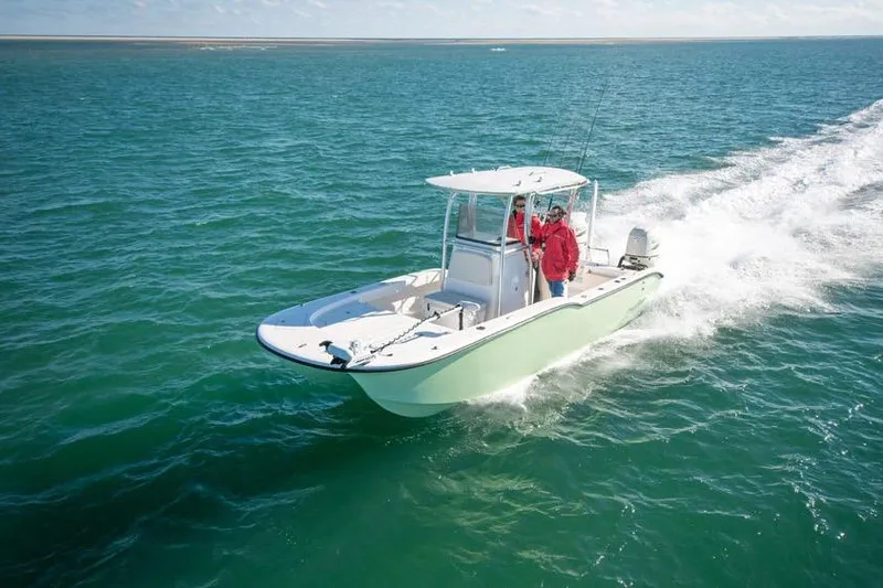 Slide: The Image of 2026 Tideline 235 Hybrid boat cruising on open water, showcasing sleek design and performance. - 8