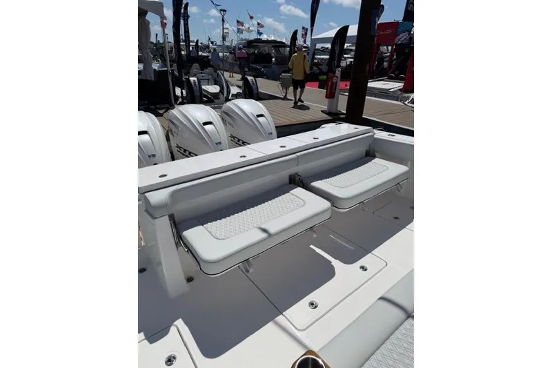 Slide: The Image of 2026 Southport 38 FE boat with seating area and engines. - 3