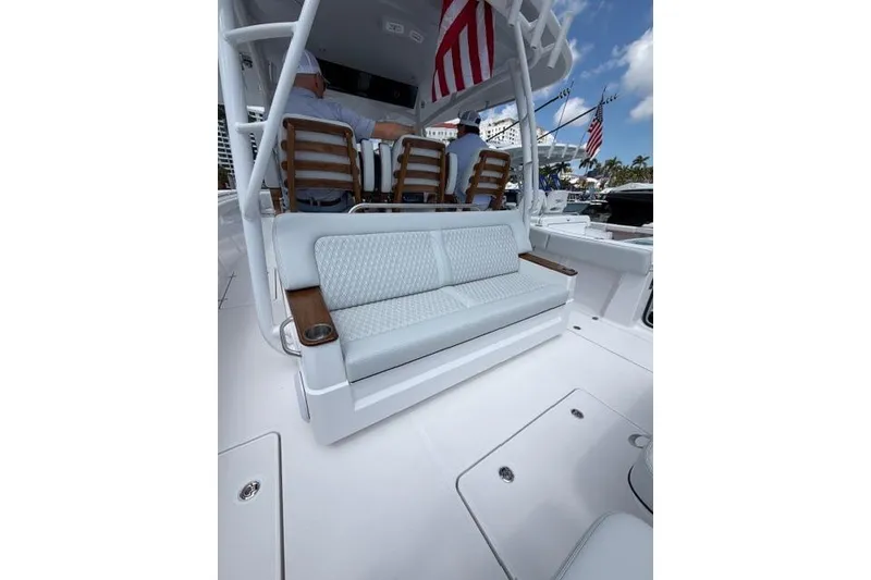 Slide: The Image of Interior of 2026 Southport 38 FE with seating area and American flag. - 5