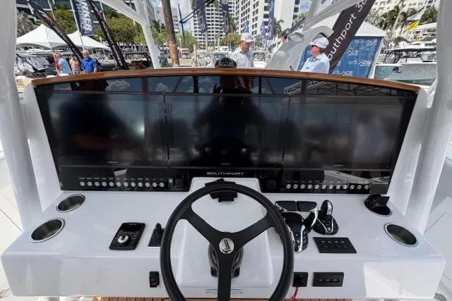 Slide: The Image of Southport 38 FE 2026 helm with advanced navigation instruments. - 7