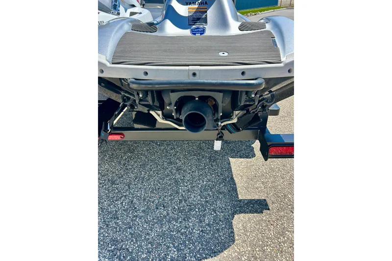 Slide: The Image of 2016 Yamaha FX Cruiser SHO rear view on trailer, showcasing exhaust and hull design. - 10