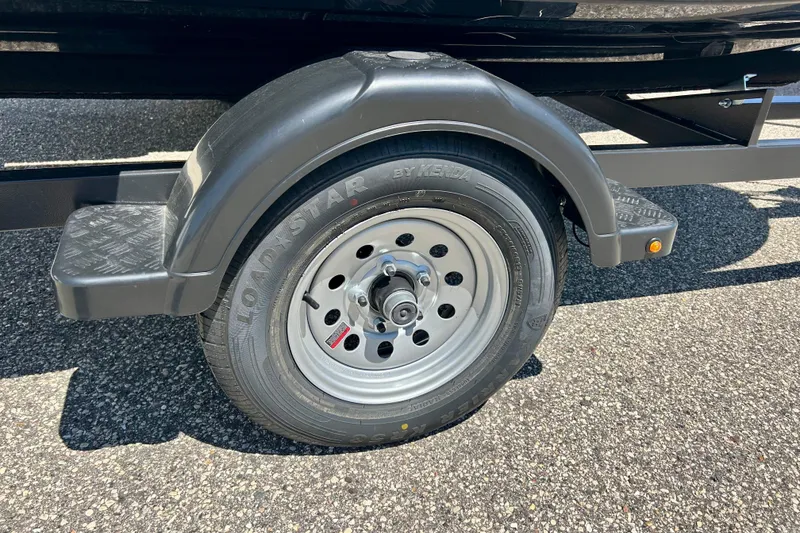 Slide: The Image of Trailer wheel for 2016 Yamaha FX Cruiser SHO on asphalt surface. - 14