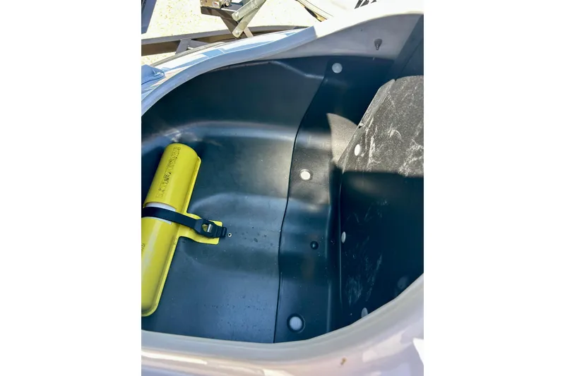 Slide: The Image of Storage compartment of 2016 Yamaha FX Cruiser SHO with yellow safety equipment. - 24
