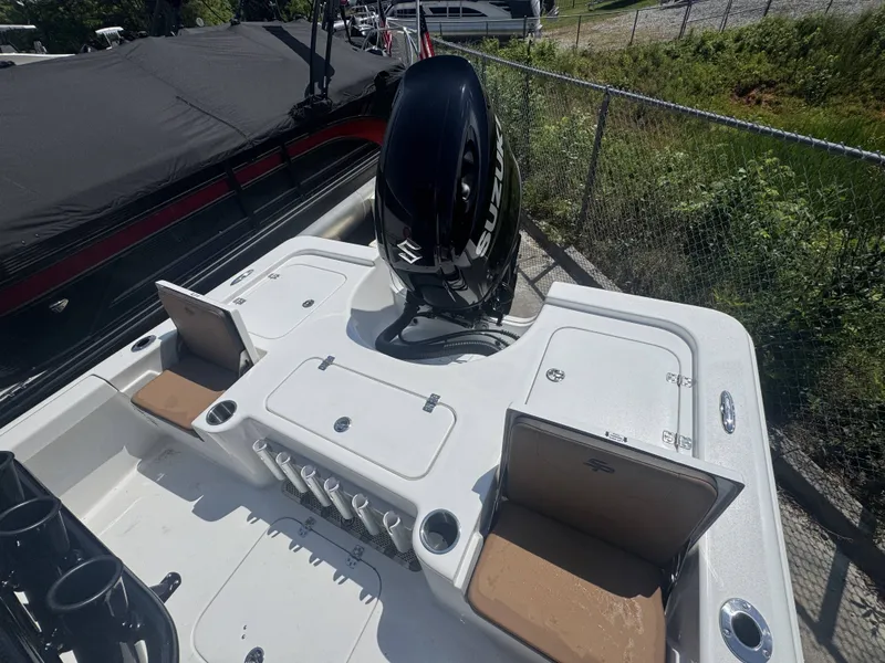 Slide: The Image of 2026 Sea Pro 230 DLX boat with Suzuki outboard motor. - 17