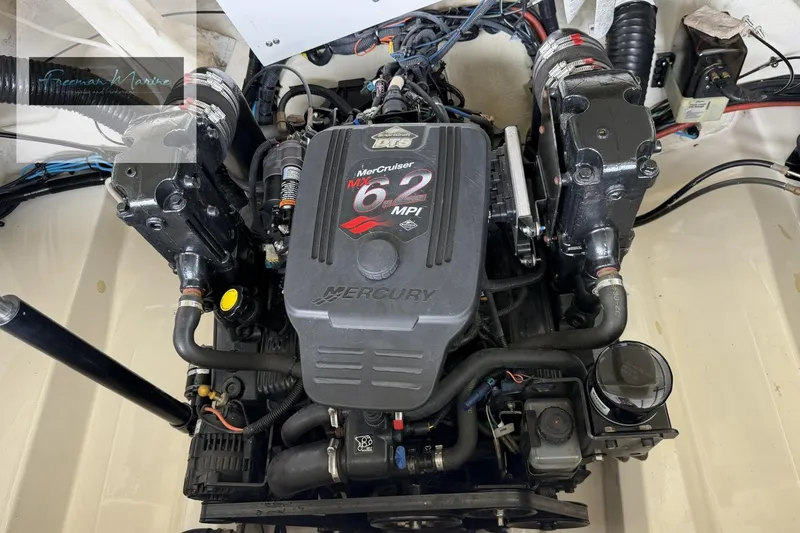 Slide: The Image of Engine of a 2008 Sea Ray 270 SLX boat, featuring a MerCruiser 6.2 MPI. - 2