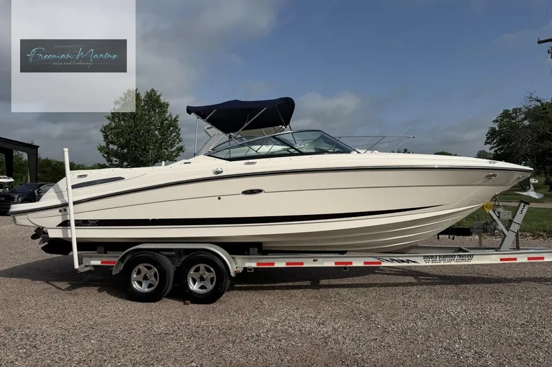 Slide: The Image of 2008 Sea Ray 270 SLX boat on trailer, side view, with canopy, outdoors. - 4