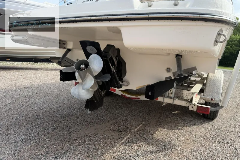 Slide: The Image of Rear view of a 2008 Sea Ray 270 SLX boat on a trailer, showcasing the propeller. - 6