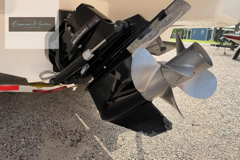 Slide: The Image of Close-up of a 2008 Sea Ray 270 SLX boat propeller and engine. - 8