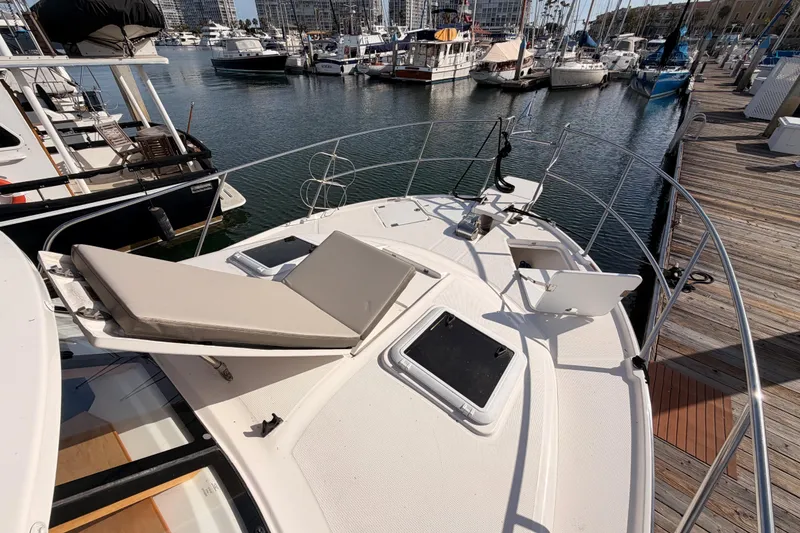 Slide: The Image of Livewell compartment on a 2021 Cutwater C-32 CB boat, featuring a central drain pipe. - 25