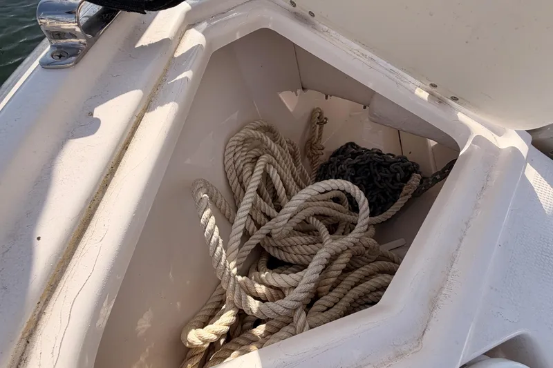 Slide: The Image of 2021 Cutwater C-32 CB yacht docked at marina with sun loungers on deck. - 28