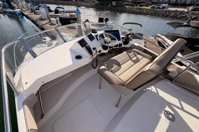 Slide: The Image of Bow view of 2021 Cutwater C-32 CB boat docked at marina. - 30